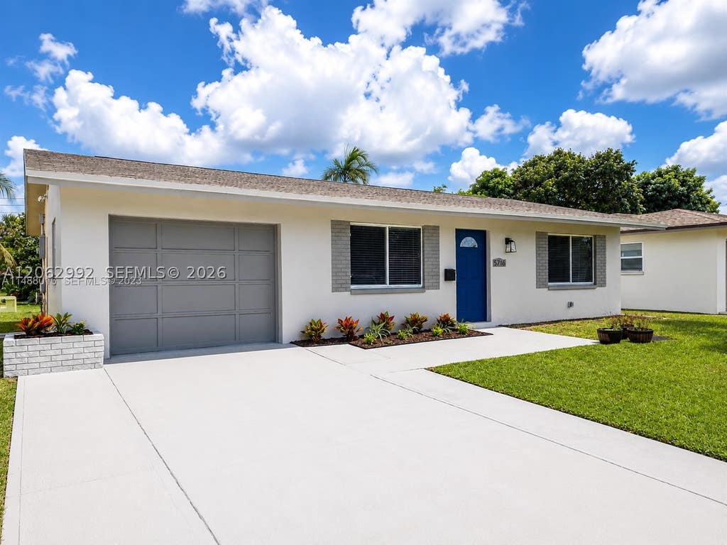 Photo of 5716 NW 70th Ter, Tamarac, FL 33321 (MLS # A12062992)