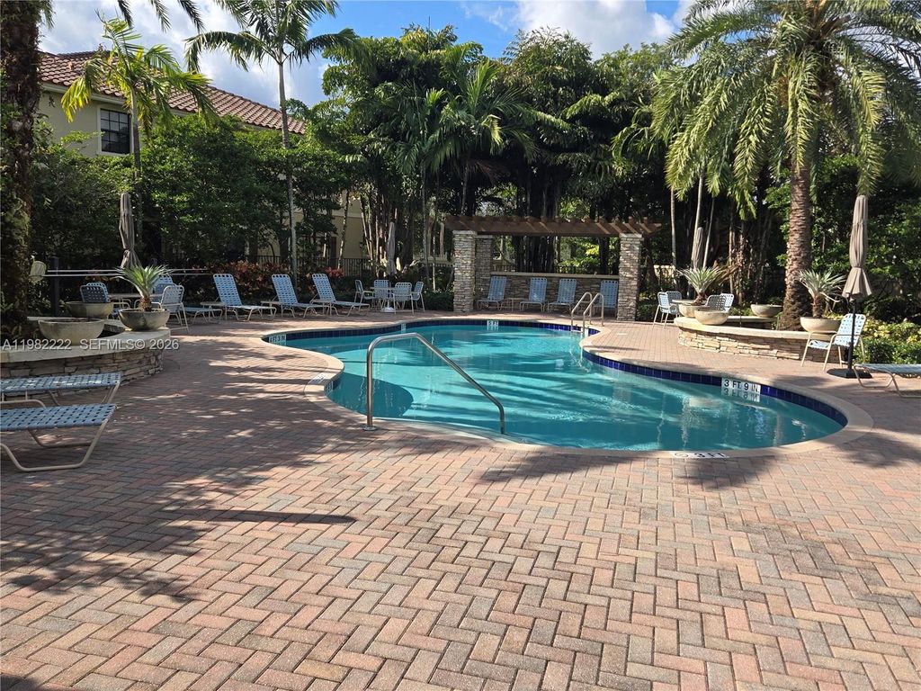 Photo of 106 Riverwalk Cir E #106, Plantation, FL 33325 (MLS # A11982222)
