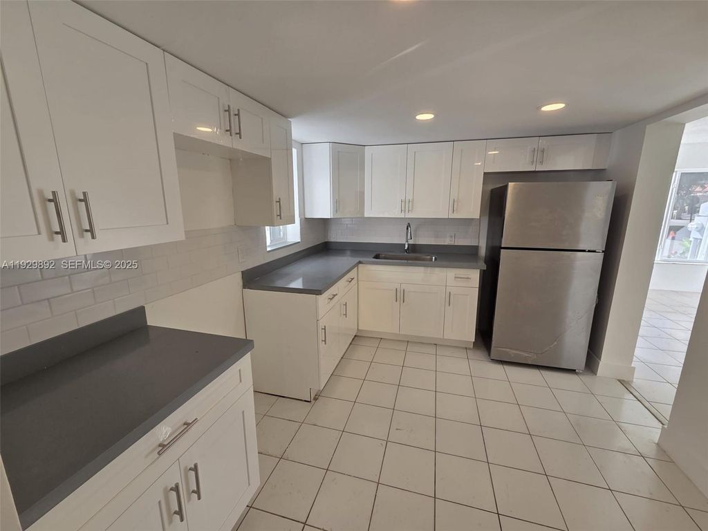 Photo of 3940 NW 76th Ter #3940, Davie, FL 33024 (MLS # A11929892)