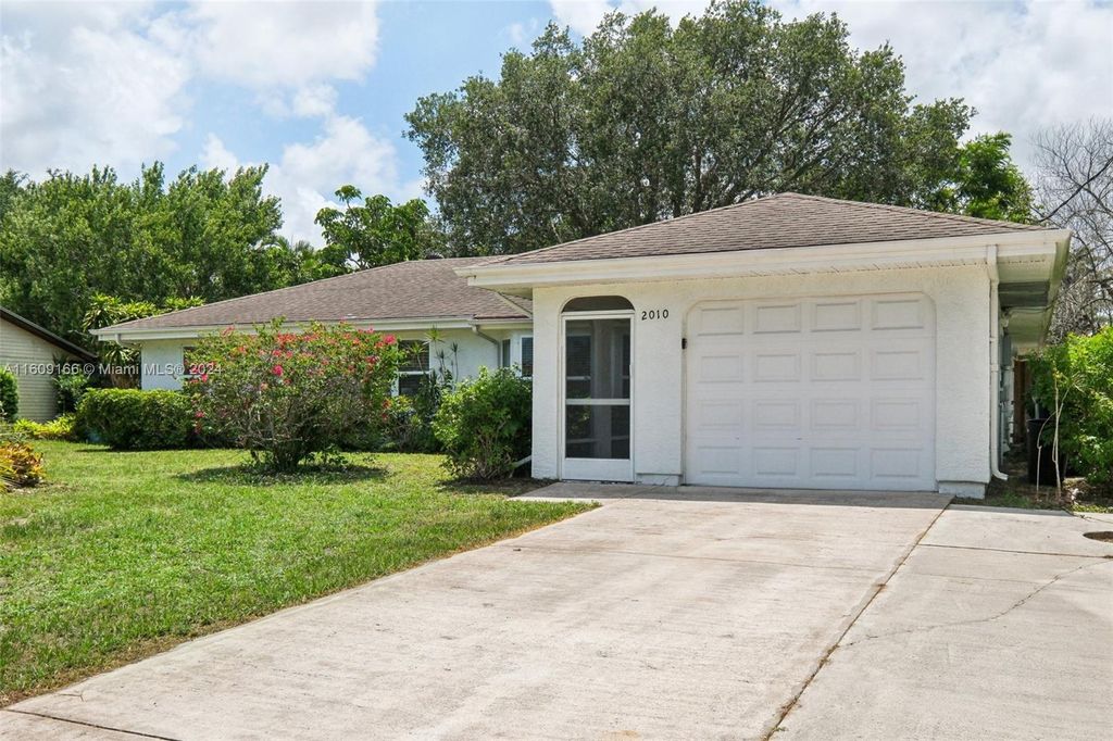 Photo of 2010 SW Brisbane St, Port Saint Lucie, FL 34984 (MLS # A11609166)