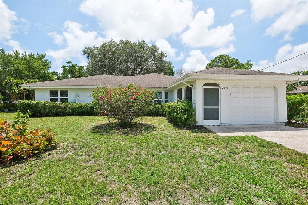Photo of 2010 SW Brisbane St, Port Saint Lucie, FL 34984 (MLS # A11609166)