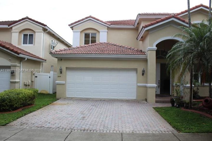 Step into luxury in the exclusive 24/7 guard-gated community of Melrose Cove in West Miramar. This beautiful two-story home at 2313 SW 126th Ave offers over 2,900 sq. ft. of bright, open living space with soaring vaulted ceilings, an updated gourmet kitchen, and a layout designed for both comfort and entertaining. The first floor features a full bedroom and bathroom, ideal for guests, extended family, or a private office. Upstairs, a large loft offers endless flexibility for a media room, playroom, or additional lounge area. The oversized primary suite includes dual walk-in closets and a spa-like en suite bath. Enjoy your own private backyard retreat with mature avocado and mango trees. Community amenities include a pool, clubhouse, and parks, all just minutes from shopping, dining, schools, and major highways. Seller is offering up to $15,000 toward the buyer’s closing costs with a full-price offer. Spacious, elegant, and move-in ready—this home is a must-see.