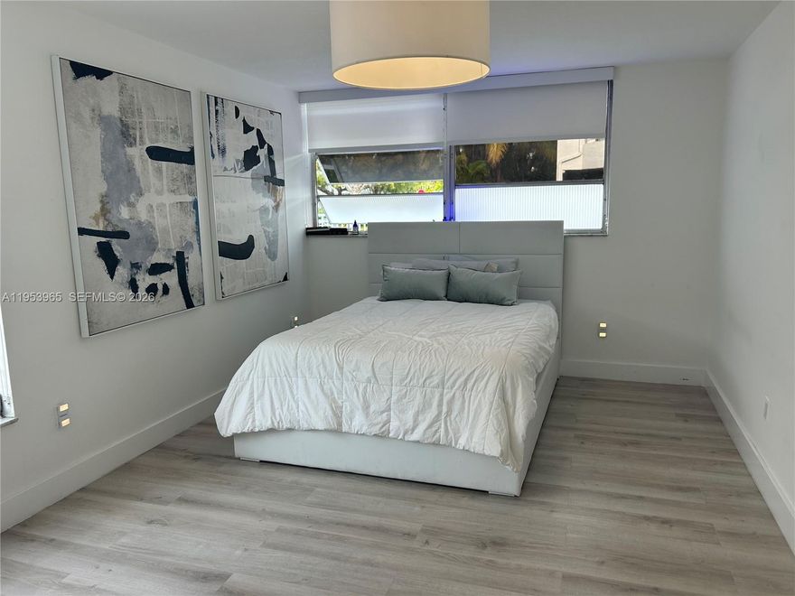 Remodeled corner unit with lots of light at Bay Harbor Islands, with large Master bathroom with walk-in-closet, office/second bedroom and visitors bath. New bathrooms, A/C, lighting, curtains, flooring. Located at ground level for easy access. This gated building offers a big pool, storage and one assigned parking. One block from the great Ruth K Broad "A" school, and walking distance from Kane Concourse and Bal Harbour Shops, places of worship and the beach! 
Unit leased until November 2026, rented for $2250/month. Great tenant.