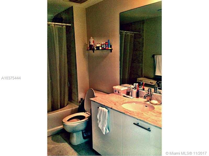 THE PLAZA 901 BRICKELL CO - Residential Lease