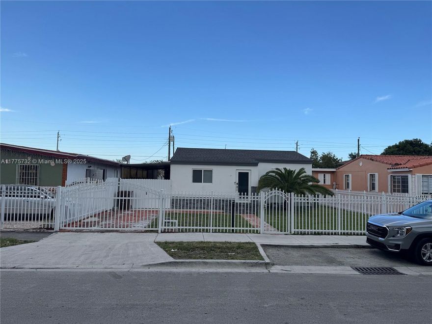 Charming 3 Bedroom, 2 Bathroom with some upgraded. This home has the potential to be divided into a 2/1 and 1/1, only have to close a door. Addition in the back has a shed of 24*12 feet converted in a beautiful efficiency. Some impacts windows and the others have accordion shutters. Most of plumbing are PVC. New: ROOF and A/C. Washer  and Dryer .It is completely fenced in with automatic car gate. Enough space in the back yard for multiple uses. NO HOA. Excellent Location and perfect for commuters.
