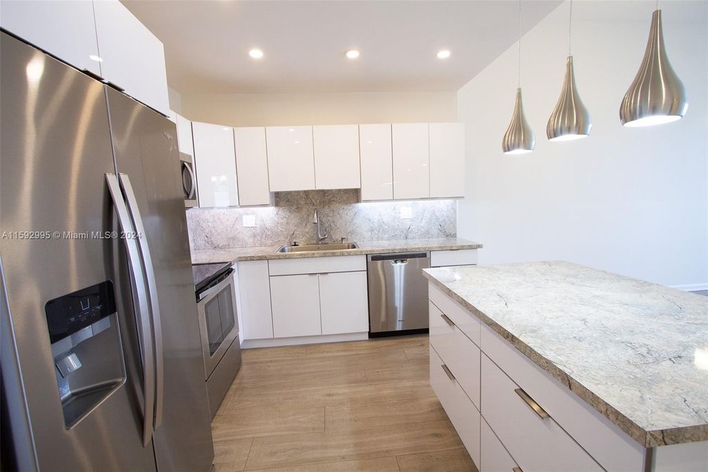 Photo of 3725 S Ocean Dr #8, Hollywood, FL 33019 (MLS # A11592995)