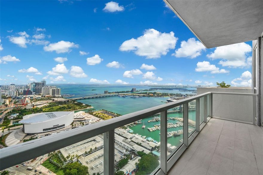 Click   Virtual Tour   above here in this listing for an unbranded full video tour.  True 5/5/1 Upper Penthouse - Premium Spacious Top of Miami Upper Penthouse full of natural light.  Opulent 3 story UPH offering 5 en-suite bedrooms plus an additional half bath for guests.  Over 3,000 sq ft interior with sweeping open views and large balconies on every level - and - an exclusive use massive rooftop courtyard.  Full en-suite on first floor, 3 full en-suites on the second floor plus a full top floor en-suite with one of a kind open air private mezzanine.   Additional half bath on entry for guest and great room use.  This true penthouse residence is masterfully renovated with porcelain, marble and wood flooring throughout, refreshed closets, designer lighting and updated baths.  3 separate HVAC systems, one for each level. Miles of wide open views - east, west, north and south of all of Miami-Dade.  Directly across from Bayfront Park and just steps to the Kaseya Center, Whole Foods, Museum and Arts District and everything downtown Miami.  Easy to show, text or use ShowingTime.