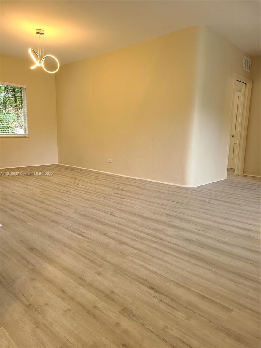 COMPLETE REMEODEL. New stainless steel appliances, flooring, window treatments, bath tub and surround tile, closet organizers, lighting, bedroom fan....EVERYTHING!!  Location Location. This quaint quiet mid century complex has Florida charm not found often. Private parking, gas utility paid by owner.  plenty of guest parking. This is a gem