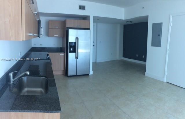 Large one bedroom apartment facing south with amazing river and Brickell skyline views. Large Balcony, porcelain floors, perfect layout with separate dining/den area. The Wind is a full service building with a chic modern lobby, pool deck and plenty of amenities. Best location…5 min walk to Brickell City center, and easy access to I-95. See broker remarks. Easy to show.