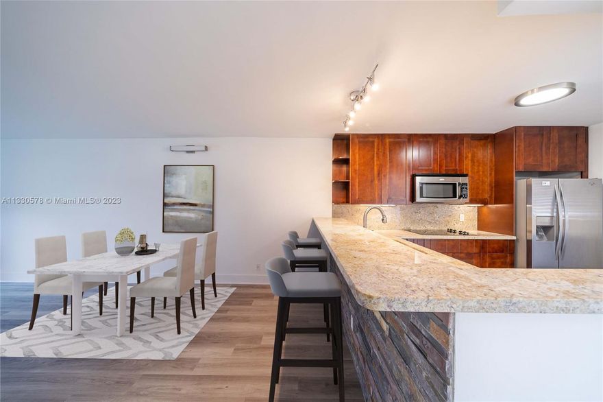 COMPLETELY RENOVATED 2/2 in Boca.  All new vinyl flooring, remodeled kitchen, and wonderful bathrooms with new tile in the shower. Granite countertop in the kitchen and SS appliances. Full-size washer and drier inside the unit. Two closets in the master bedroom. Investor friendly, can be rented right away. No pets. All ages, near A-Rated Schools, shoppings, and parks. One assigned parking spot and plenty of guest parking. The building has about 36 cameras.