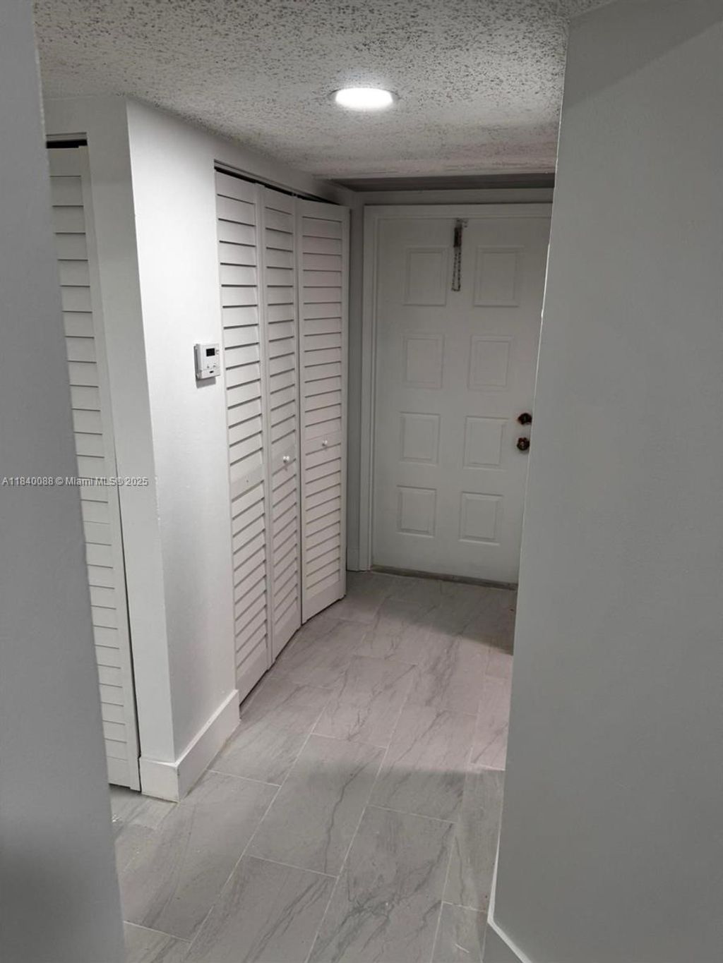 Photo of 9927 Twin Lakes Dr #9927, Coral Springs, FL 33071 (MLS # A11840088)