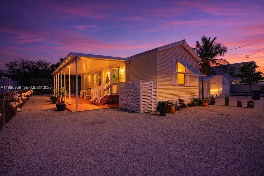 Excellent investment opportunity in Key Largo! This 2-bedroom, 1-bath manufactured home offers strong potential as a vacation rental, seasonal retreat, or long-term income property.

The home features an open layout, updated kitchen with stainless steel appliances, and a large covered porch—perfect for outdoor living, which is highly desirable for renters in the Keys. The oversized lot allows for ample parking, storage, or customization to further increase value.

Located in a community with access to a private boat ramp and waterfront lounging area—a major draw for tenants and vacation guests seeking boating and water access without premium waterfront pricing.

Positioned near popular restaurants, marinas, and recreational attractions, this property is ideally suited to capitalize on the high demand for Keys rentals.

Low-maintenance, high-demand location—ready to generate income or serve as your personal getaway