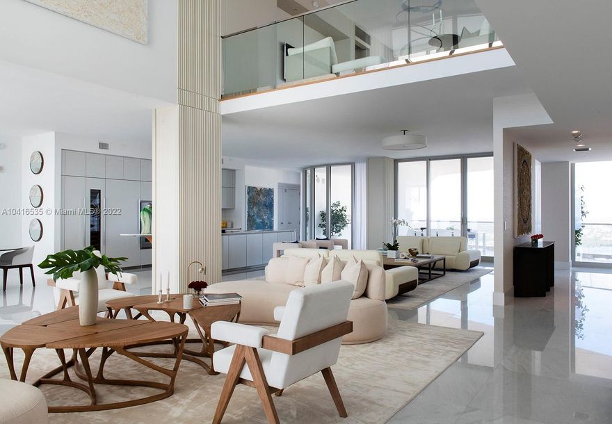 Exquisitely finished and furnished Penthouse designed by Meyer-Davis. 180 degrees ofcompletely unobstructed views of Downtown Miami, the intracoastal, and the ocean. This true flow through has 20 ft ceilings in the living area and over 6,500 sq ft under AC with5 bed/6.5 baths + den, study, family room, service quarters + midnight bar + master seating area. A dream home in the sky!