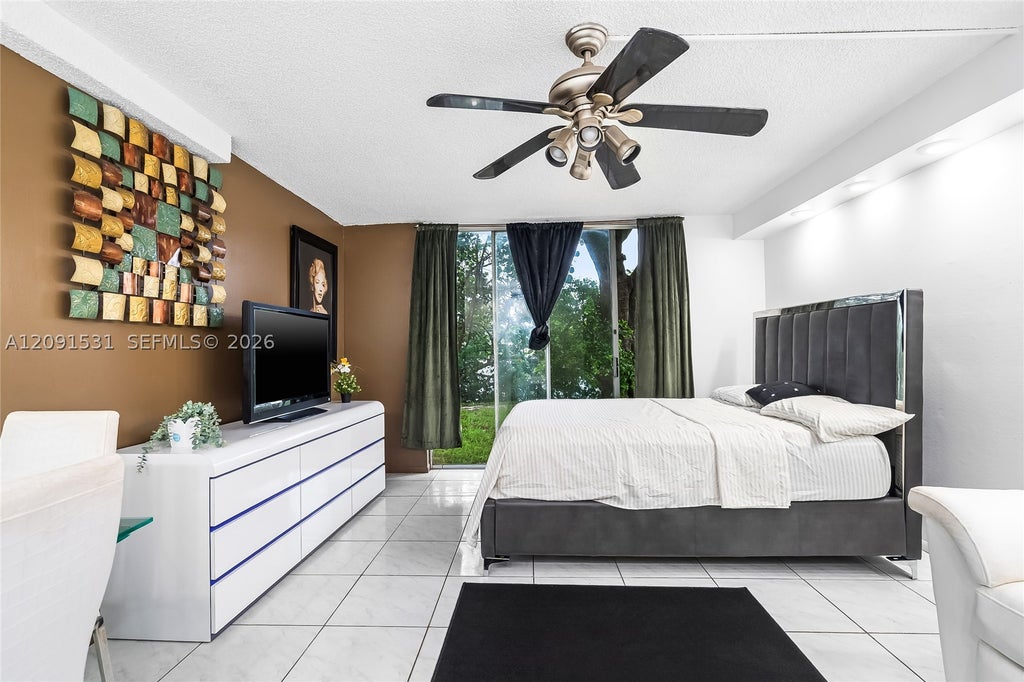 Photo of 3720 Inverrary Dr #1M, Lauderhill, FL 33319 (MLS # A12091531)