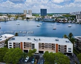 Photo of 200 Golden Isles Dr #401, Hallandale Beach, FL 33009 (MLS # A12075594)