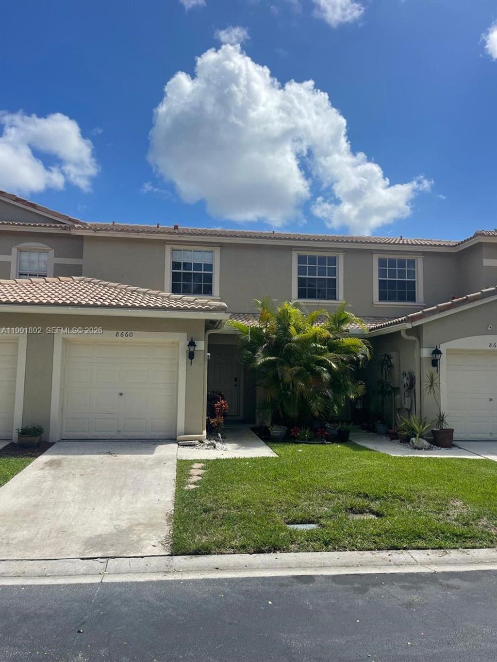 Photo of 8530 W Southgate Shores Cir #1, Tamarac, FL 33321 (MLS # A11991892)