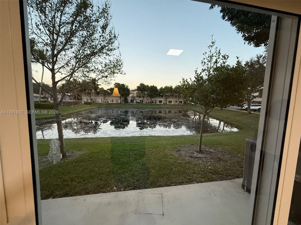 Photo of 8530 W Southgate Shores Cir #1, Tamarac, FL 33321 (MLS # A11991892)