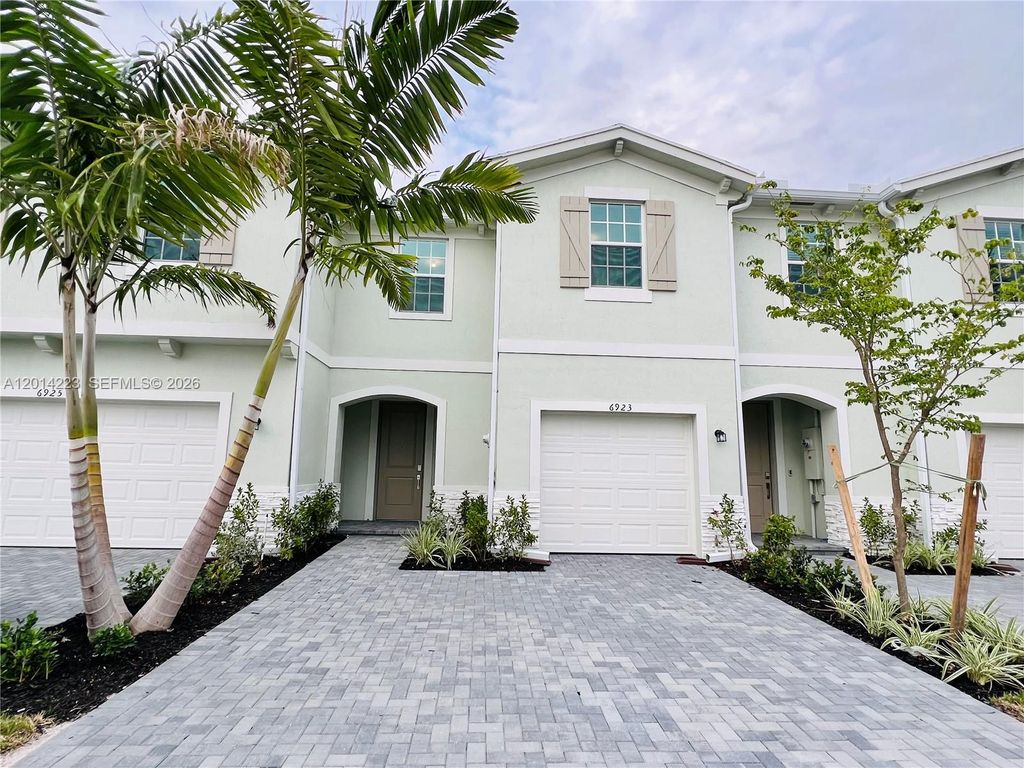 Photo of 6923 Harbours Edge Ave, Lake Worth, FL 33467 (MLS # A12014223)