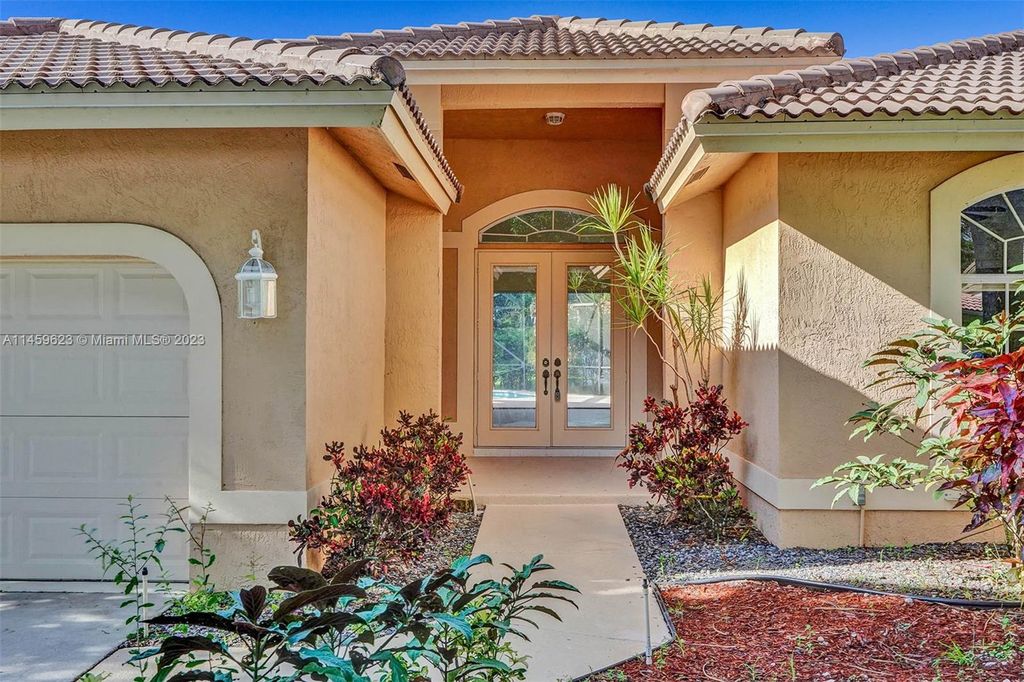 Photo of 5163 Chardonnay Dr, Coral Springs, FL 33067 (MLS # A11459623)