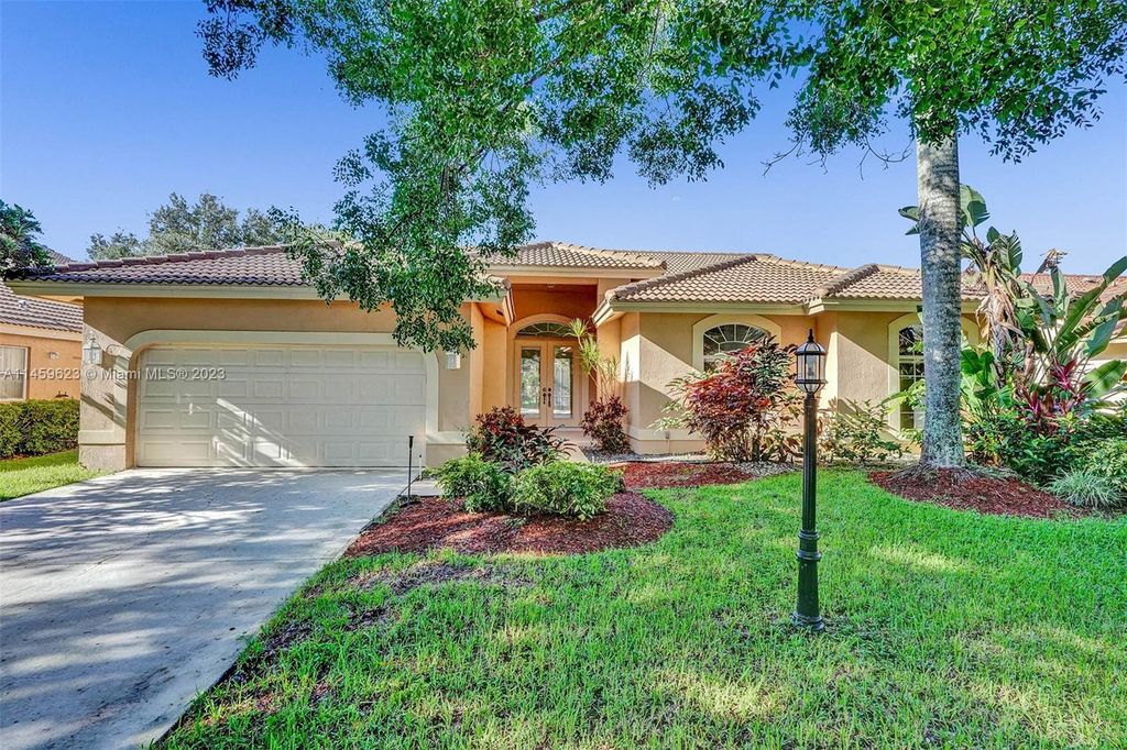 Photo of 5163 Chardonnay Dr, Coral Springs, FL 33067 (MLS # A11459623)
