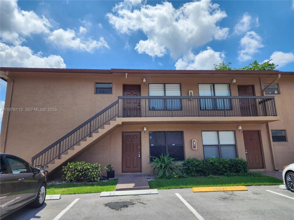 Photo of 10046 Winding Lake Rd #201, Sunrise, FL 33351 (MLS # A11976113)