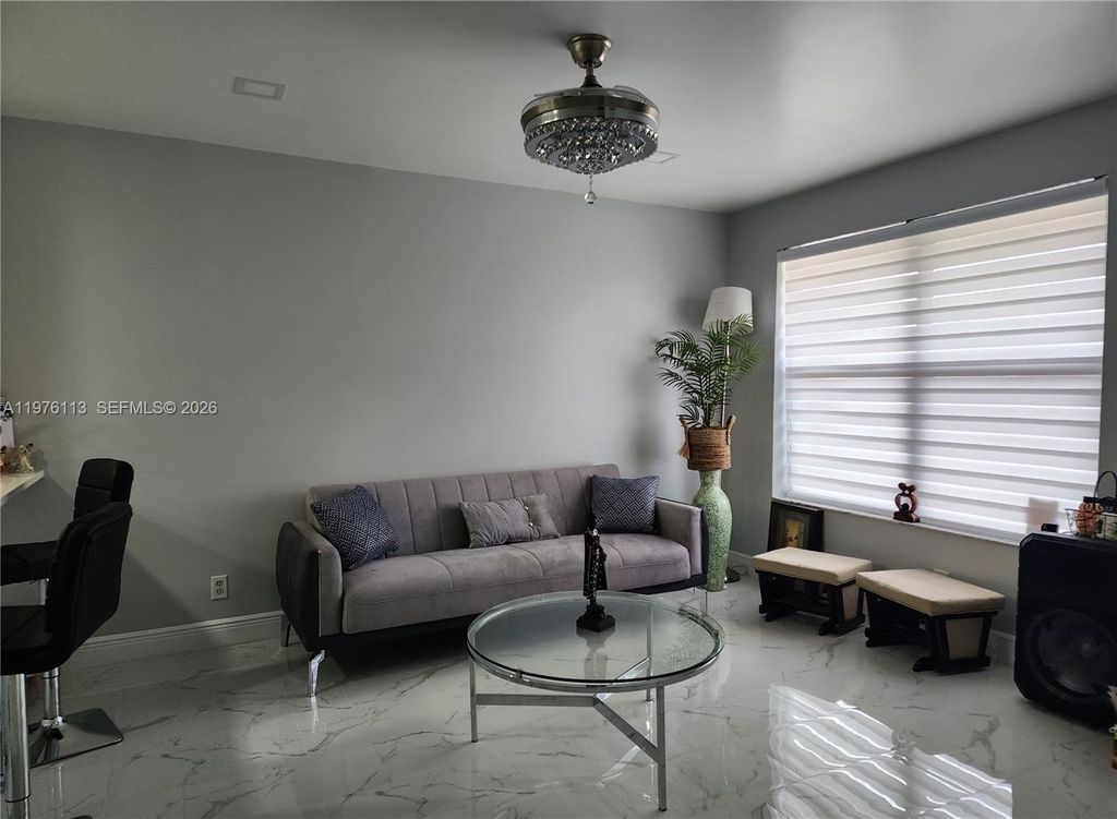 Photo of 10046 Winding Lake Rd #201, Sunrise, FL 33351 (MLS # A11976113)