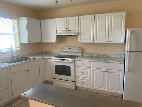 Photo of 10772 La Placida Dr #7-301, Coral Springs, FL 33065 (MLS # A11873424)