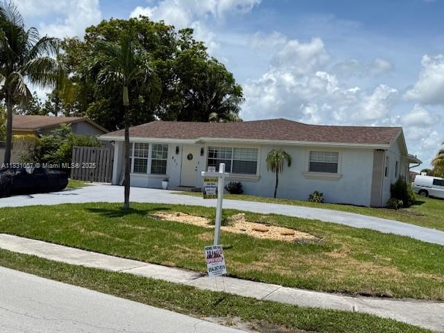 Amazing, spacious home with 4 bedrooms, 2 bathrooms, a split floor plan, and a great layout! No HOA and just 7 minutes to Deerfield Beach Pier and 2 minutes to I-95 and the Turnpike.
This remodeled turnkey home features a brand-new roof with a 10-year warranty, updated plumbing and electrical throughout, contemporary light fixtures, new gutters, fresh landscaping, and newly painted interiors and exteriors. The kitchen is fully redone with granite countertops and stainless steel appliances, while the bathrooms have been refurbished. Enjoy new flooring throughout, a separate laundry room with a utility sink, a fully fenced yard with a storage shed, a new AC unit, and modern window treatments. Financing options available!