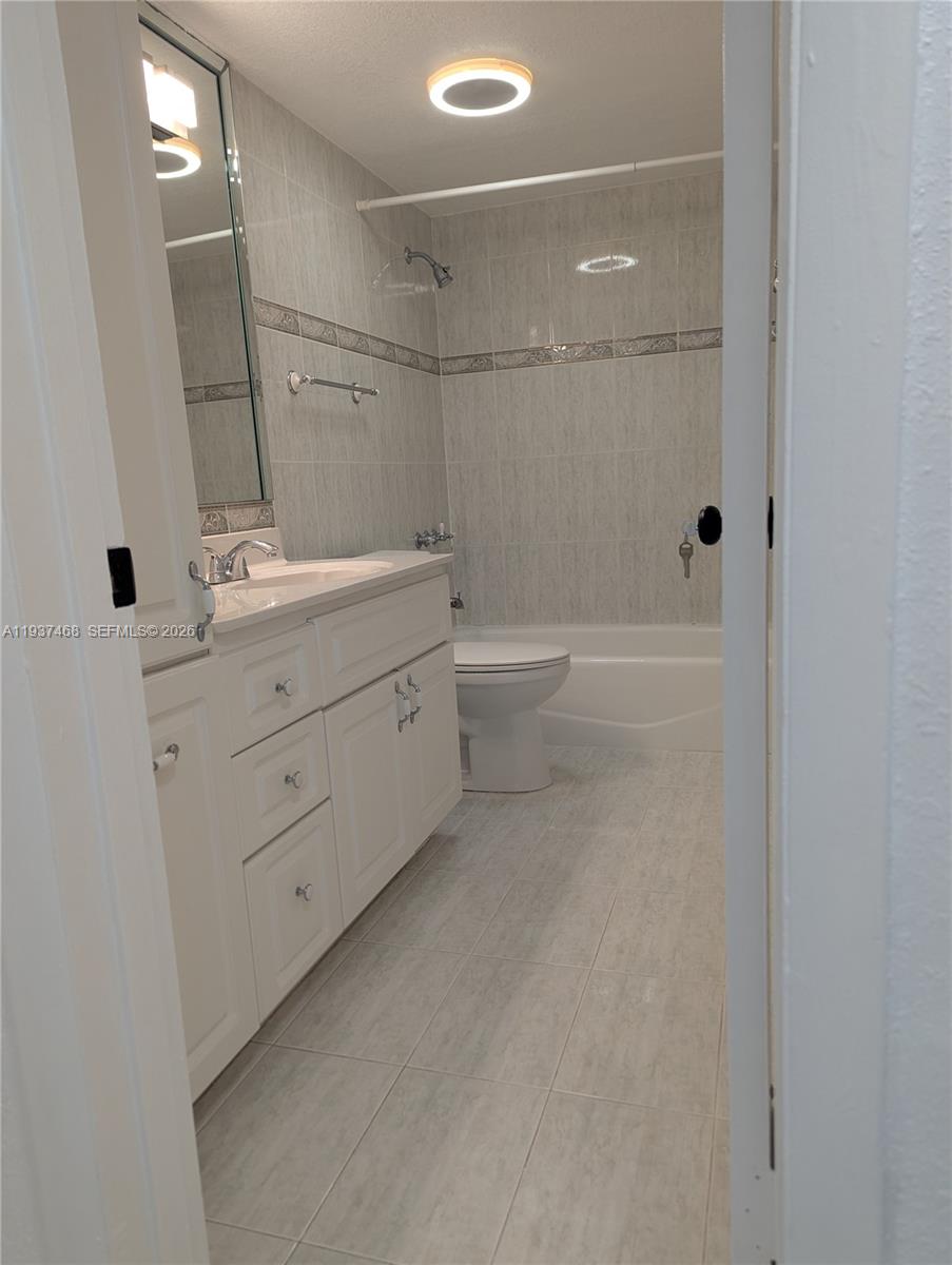 PALM-EAST GARDENS CONDO - Residential