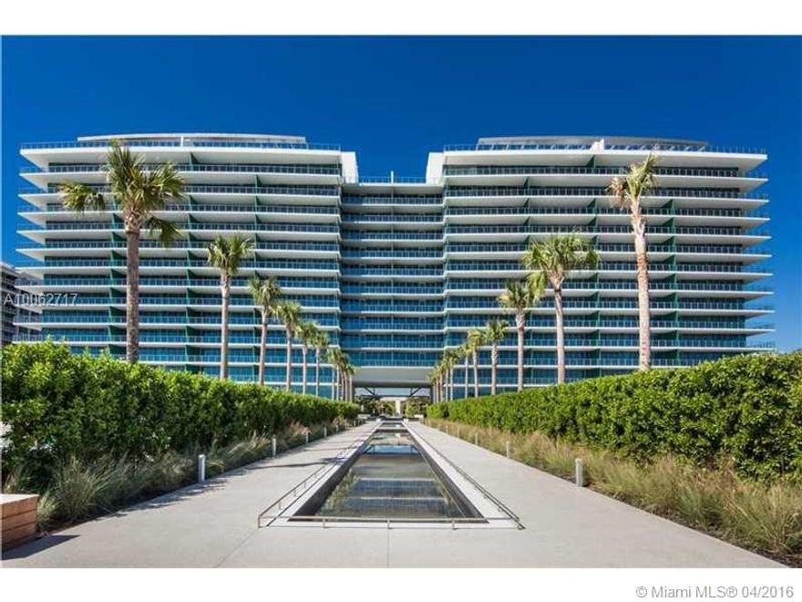 Enjoy Spectacular Ocean views from all rooms of this Lower Penthouse. Oversized balcony perfect for entertaining. Impressive 12 Ft High ceilings. Harwood flooring. Modern kitchen design w/ Miele appliances & Quartz counters.  Split plan + Den.  Private elevator & foyer. Storage & 3 parking spaces. Top-notch amenities: 500 feet of beachfront, Security, 100x100 Pool, Beach Services, Restaurant, Spa, Fitness Center, Tennis, Putting Green, Meeting Room, Private Cinema, and more.
