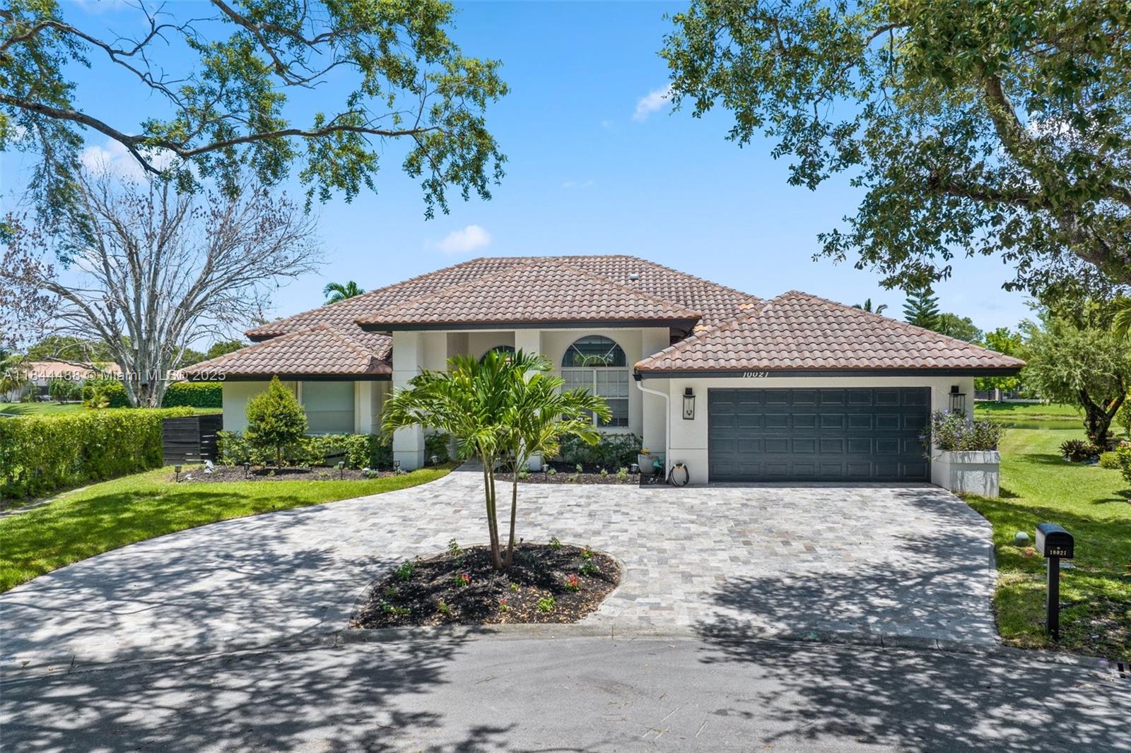 Wow! Amazing 5 Bed/3 Bath Pool Home With 2 Car Garage & Panoramic Lake View Located In Prestigious North Springs! No HOA. This Home Has A Large Triple Split Open Layout With Lots Of Natural Light. Formal Dining Room And Spacious Living/Dining Area. Updated Kitchen With Quartz Countertops, Wood Cabinets, SS Appliances, Miele Cooktop, Commercial Microwave, Pantry, & Breakfast Nook. Large Primary Suite Has Dual Walk-In Closets, Separate Tub & Shower, Marble Floors & Shower. Luxury Vinyl Floors. All Bathrooms Are Updated. Dual-Zone Newer A/C. Water Heater (2016), Laundry Room W/New W/D. Ev Charger. Impact Windows & Garage Door +Shutters. Oversized Pie Shaped Outside Private Backyard Oasis With A Sparkling Pool, Waterfront, And A Spacious Patio Area, Too Many Upgrades To Mention. Must See!