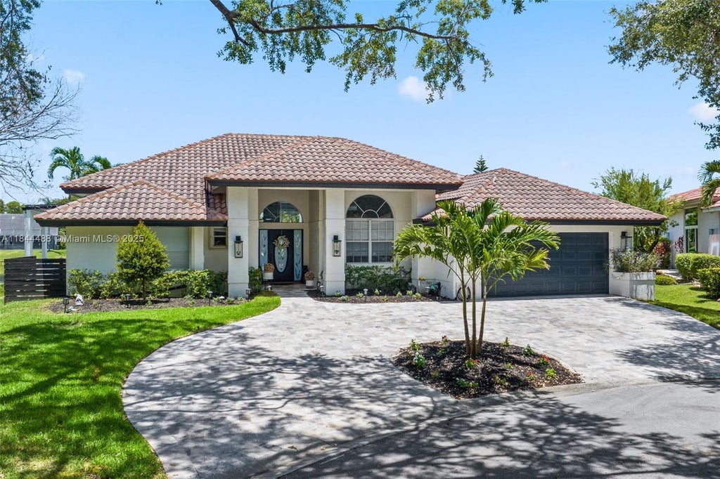Photo of 10021 NW 50th Mnr, Coral Springs, FL 33076 (MLS # A11844488)