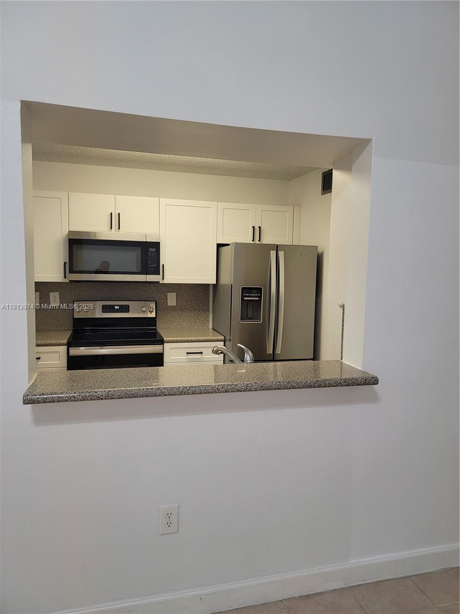 THE GREENS AT DORAL CONDO - Residential Lease