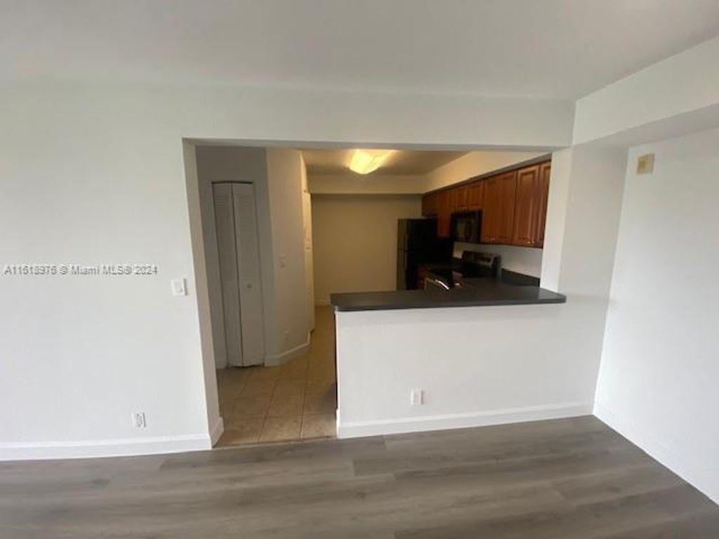 Photo of 10115 W Sunrise Blvd #202, Plantation, FL 33322 (MLS # A11618976)