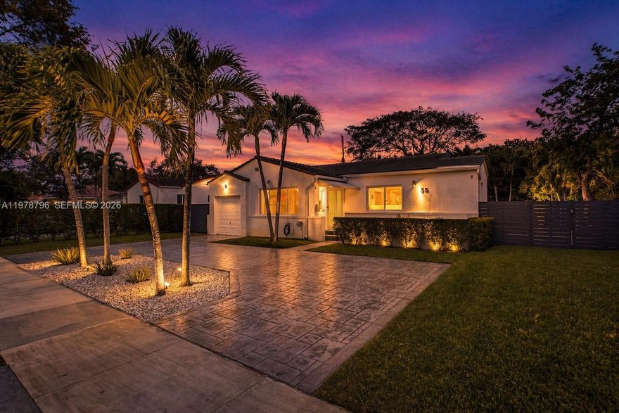 Nestled in the highly desirable Miami Shores, this updated 2 bedroom home sits on a tree-lined street and boasts a spacious lot with an inviting outdoor area, ideal for entertaining. Thoughtfully upgraded in 2020, the property features a new roof, electrical panel, hurricane impact windows and doors, irrigation system, and a circular driveway. The redesigned kitchen and fully renovated bathrooms reflect modern style and functionality. The flexible floorplan includes a versatile room currently used as a dining area, easily convertible into a third bedroom. The garage has been transformed into a climate-controlled gym with a brand-new split AC unit, offering additional lifestyle space. Every detail has been carefully considered for comfort, style, and modern living.