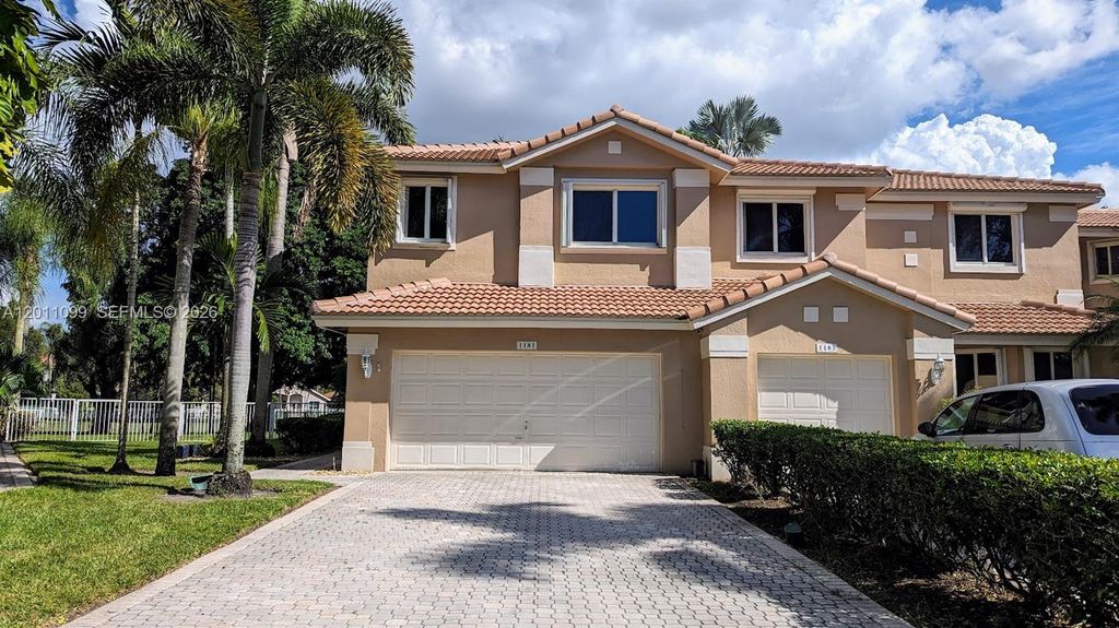 Photo of 1181 SW 158th Ave #1181, Pembroke Pines, FL 33027 (MLS # A12011099)