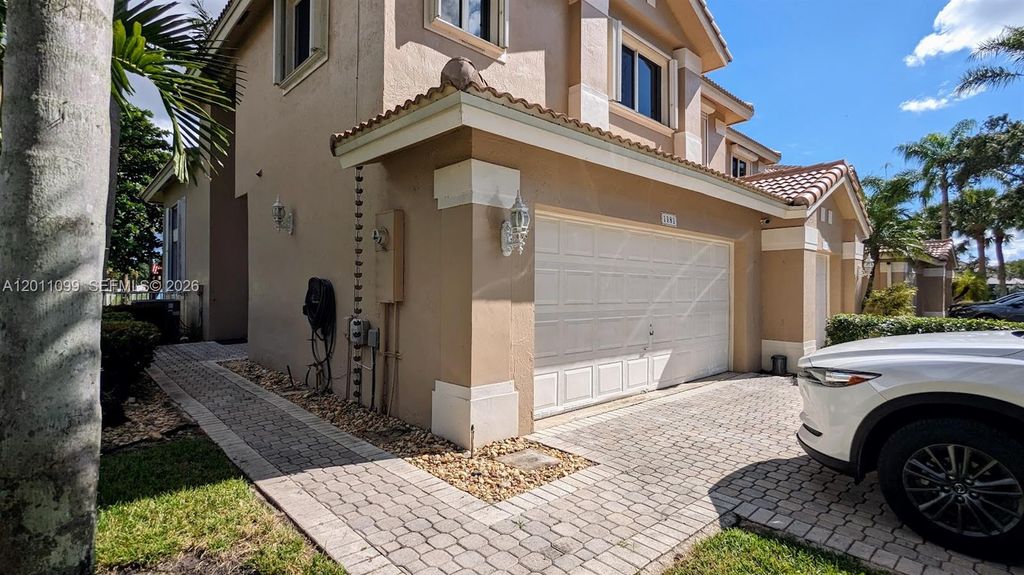 Photo of 1181 SW 158th Ave #1181, Pembroke Pines, FL 33027 (MLS # A12011099)