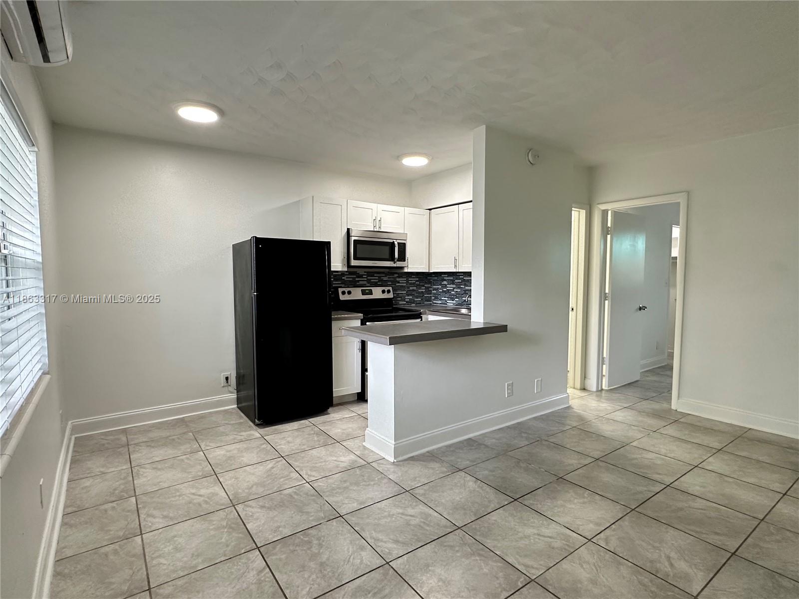 Centrally located gem! 1st floor unit, tucked away in a cute building, with a spacious layout! Newly remodeled 1 bed 1 bath apartment in the coveted Victoria Park area of Fort Lauderdale. Unit features pristine upgrades including newer appliances, tile flooring, new AC & electrical. Bask in the convenience of walk-in closets, impact windows, and a private patio just outside of the unit w/ laundry in the building + ample parking on-site. Nestled in a prime location, this charming complex has a private pool, picnic area & outdoor lounge/patio area. Near excellent schools, lush parks & major highways. Just mins away from the beach & the vibrant downtown Fort Lauderdale scene, with its array of shops & restaurants. Water, waste, sewer, maintenance included. Pet friendly. Handicap accessible.