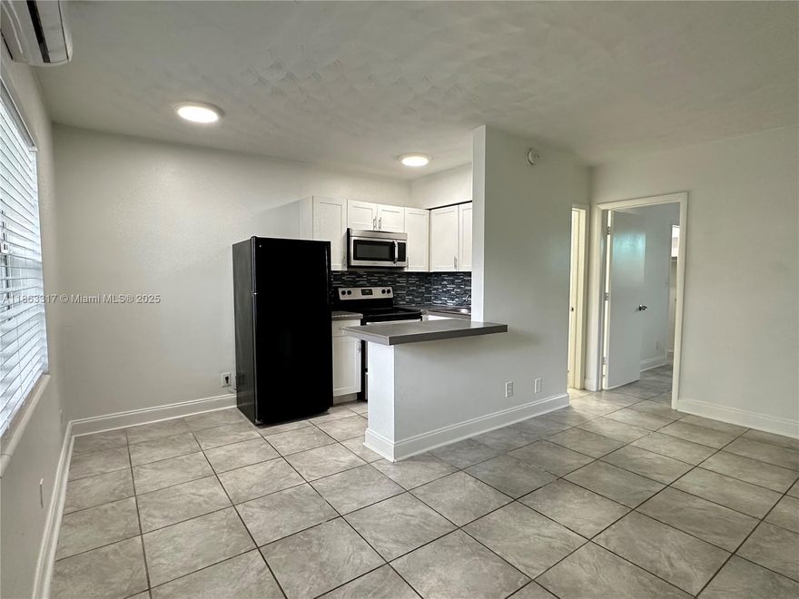 Centrally located gem! 1st floor unit, tucked away in a cute building, with a spacious layout! Newly remodeled 1 bed 1 bath apartment in the coveted Victoria Park area of Fort Lauderdale. Unit features pristine upgrades including newer appliances, tile flooring, new AC & electrical. Bask in the convenience of walk-in closets, impact windows, and a private patio just outside of the unit w/ laundry in the building + ample parking on-site. Nestled in a prime location, this charming complex has a private pool, picnic area & outdoor lounge/patio area. Near excellent schools, lush parks & major highways. Just mins away from the beach & the vibrant downtown Fort Lauderdale scene, with its array of shops & restaurants. Water, waste, sewer, maintenance included. Pet friendly. Handicap accessible.