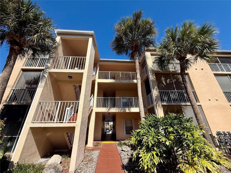 Welcome home to Hammocks Trails- This private 3rd floor corner penthouse features spacious living & dining area with vaulted ceiling. Tile floors throughout- Large screened balcony includes a separate laundry/storage room. Updated kitchen includes solid maple wood cabinets, stainless steel gas stove/oven, refrigerator and a separate pantry. Primary bedroom includes a full walk-in closet. Updated bath with marble vanity and combination shower/tub.  Enjoy the resort style amenities including pool, gym, walking trails, and the serene beachfront lake. Close to major shopping centers, parks, top rated schools, and access to the Florida turnpike and expressways.