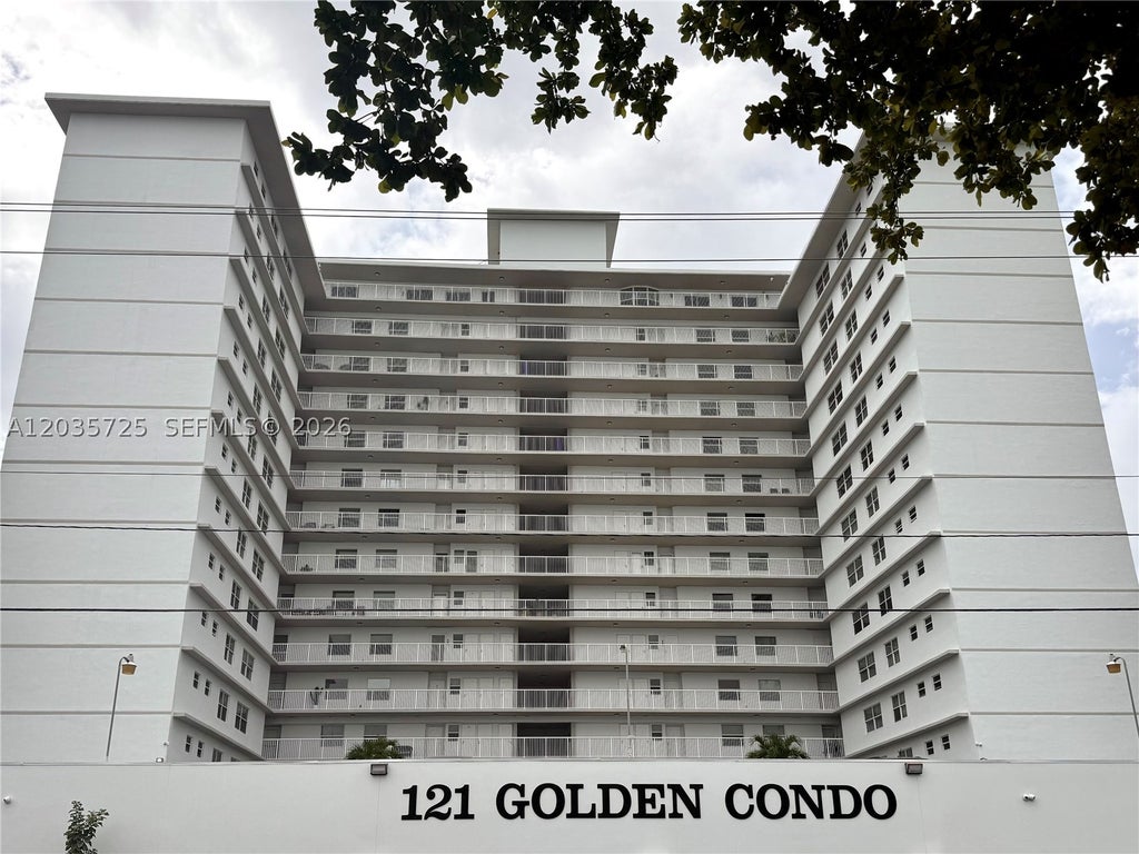 Photo of 121 Golden Isles Dr #904, Hallandale Beach, FL 33009 (MLS # A12035725)