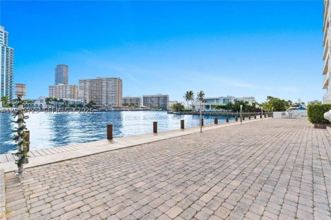 Photo of 121 Golden Isles Dr #904, Hallandale Beach, FL 33009 (MLS # A12035725)