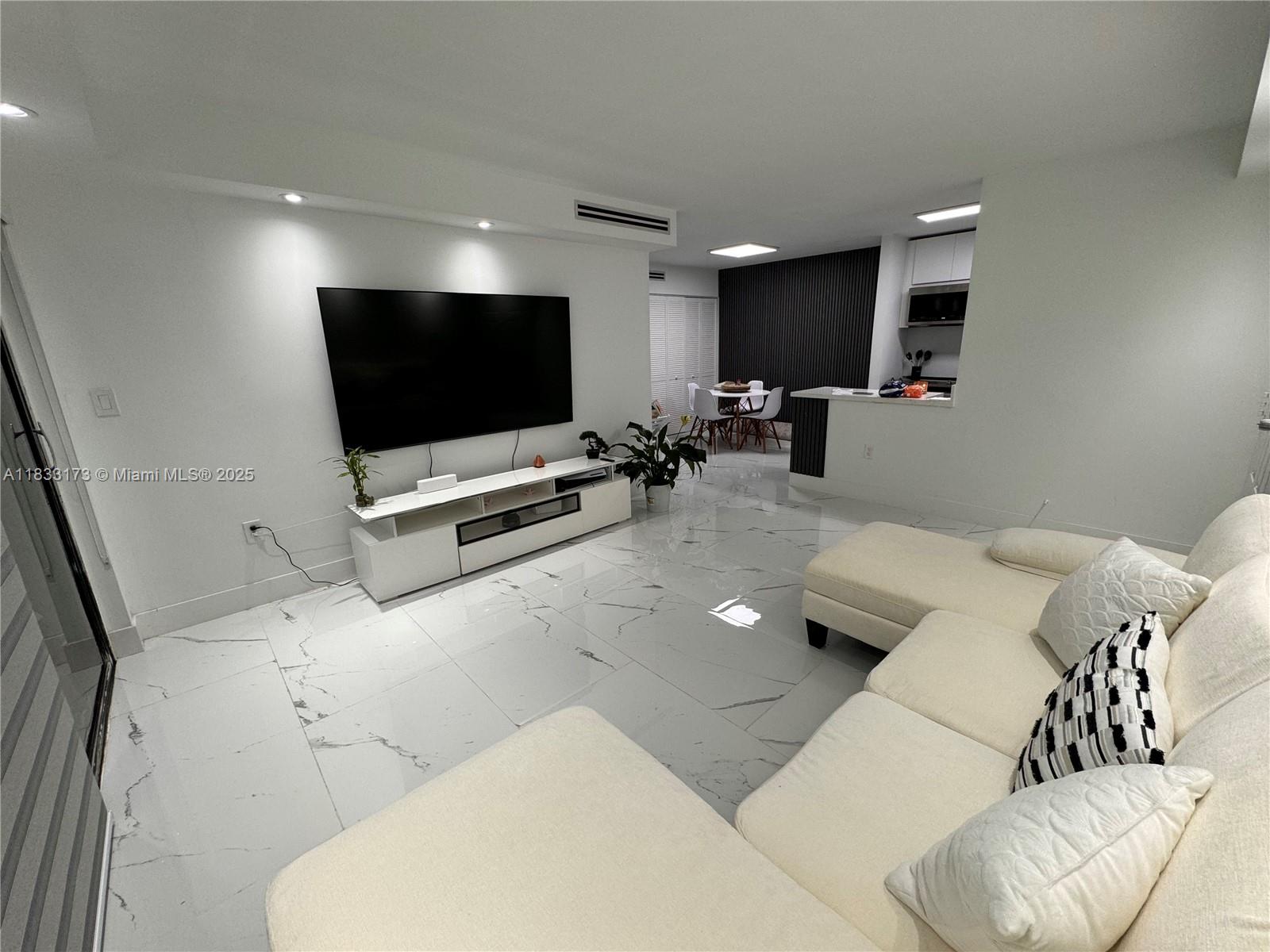 Miami Beach Luxury in Hialeah, this was a full renovation. Everything has been upgraded or replaced with new technologic. Top the line products have been used to upgrade this gorgeous apartment , porcelain tile all around the apartment and high end finish in the bathrooms. New custom kitchen with quartz and new appliances. Major electrical upgrade , plumbing upgrade , New A/C unit and new Water Heater ,washer & dryer in the unit
