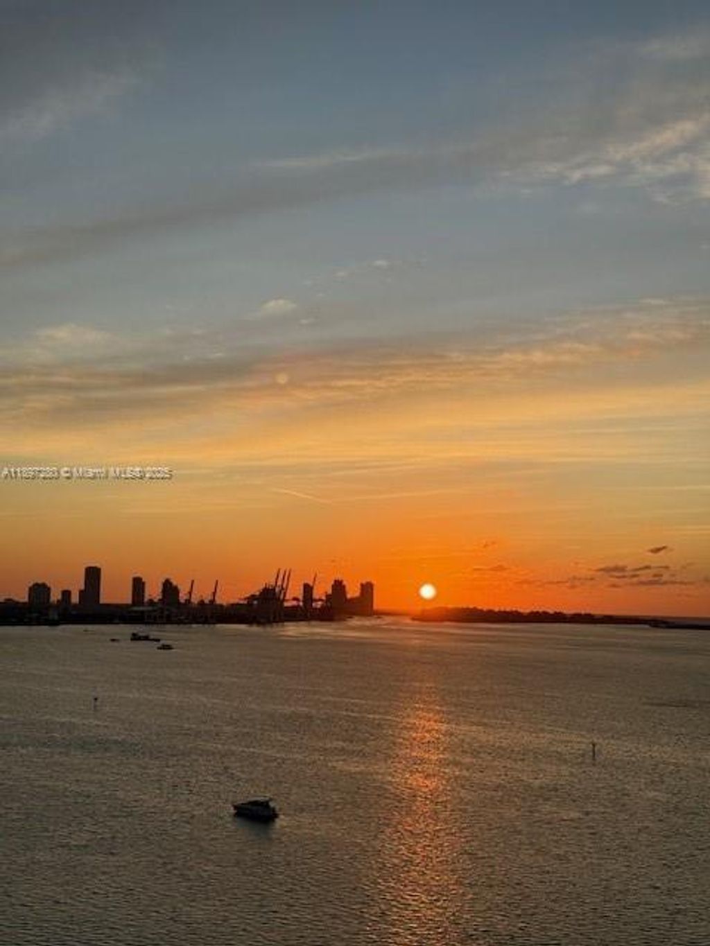 Photo of 1155 Brickell Bay Dr #1210, Miami, FL 33131 (MLS # A11897280)