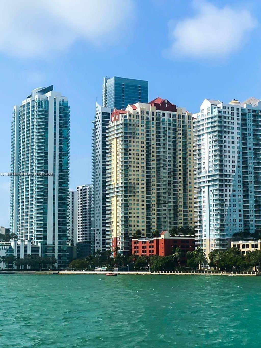 Photo of 1155 Brickell Bay Dr #1210, Miami, FL 33131 (MLS # A11897280)
