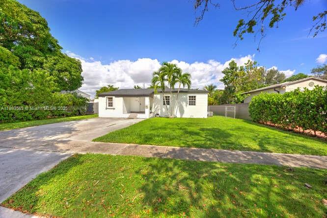 Charming West Miami Home! This classic 1946 home boasts 1,980 sf of living space (as per plans submitted to West Miami) with updates throughout, including 2024 roof, 2015 A/C, tiled floors, a combination of impact windows & doors and shutters. Located in centrally situated West Miami, this property offers easy access to major roadways shopping and dining. A perfect blend of character, comfort and convenience in a quiet, established community.