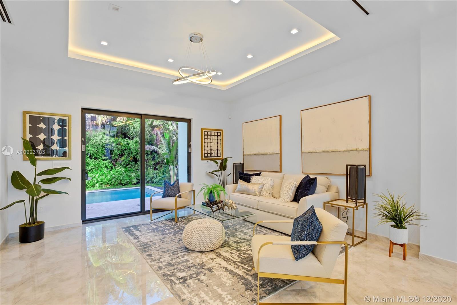 Ultra Modern stylish new home in Miami Beach. Be in the middle of everything: The beach, restaurants, shopping, and houses of worship. The finest details and outstanding architecture make this home one of a kind.
Two laundry rooms, a Cabana bath, and lots of built-in cabinets serve your comfortable Florida living. High-end appliances with a custom kitchen island and spacious pantry are a chef’s dream! Custom chandeliers greet you in the main living areas and the master. Every bathroom has custom picked finishes and touchless mirror lighting. It is not easy to find a house that has been done with so much love and attention to detail.
Move right in! A Beautiful Miami Home.