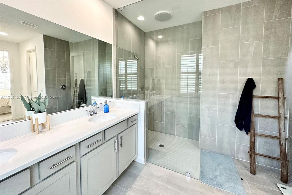 Photo of 11349 SW Lyra Dr, Port Saint Lucie, FL 34987 (MLS # A11351157)