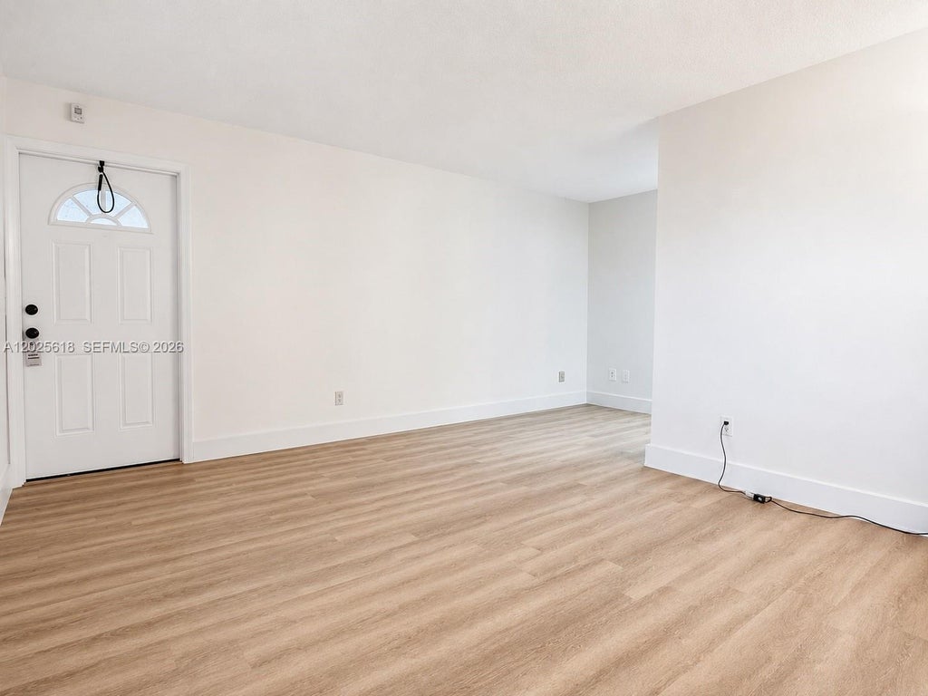 Photo of 421 NE 1st St #221, Hallandale Beach, FL 33009 (MLS # A12025618)