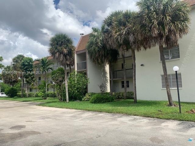 Welcome to this spacious 2/2 condo at Omega 8 in Plantation. The split-bedroom layout ensures privacy. Unit comes with washer/Dryer for convenience. Kitchen has a breakfast area. Relax and enjoy Resort style amenities, including a clubhouse, tennis, Gym, Billiards Room, Pool, shuffleboard, ample guest parking, and more. Enjoy a sparkling pool and barbecue area steps away. Conveniently located near Sawgrass Mall, minutes from the Plantation Tech Center, Medical offices, nearby shops, near highways and diverse dining options. Garden view with enclosed Florida room. Perfect for first time buyers, downsizers or to move to beautiful Plantation. This home offers comfort and convenience. Up to one dog (under 16 lbs) and two cats allowed. We listen to all offers.